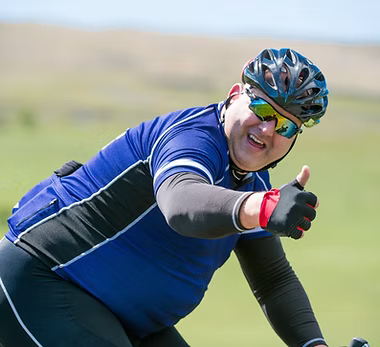 Cyclist giving a thumbs up after a healthy ride